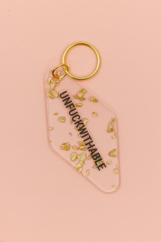 UNFUCKWITHABLE Motel Style Key Tag Keychain in Clear with Gold Leaf